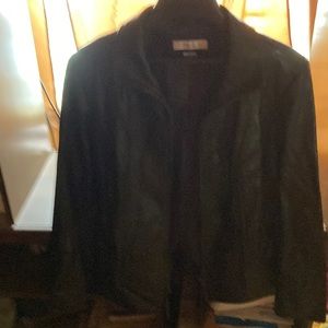 never worn soft leather jacket in perfect condition. brown zipper up & pockets